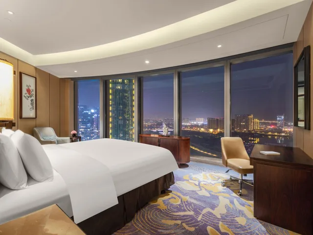 جناح تنفيذي بسرير كينج بغرفة نوم واحدة بمنطقة جلوس، Shangri-la Hotel, Yiwu 2/4
