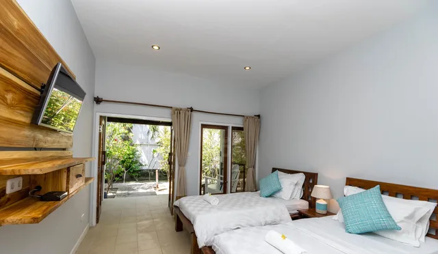 غرفة بسريرين منفصلين بإطلالة على الحديقة، Bale Sampan Bungalows 3/10