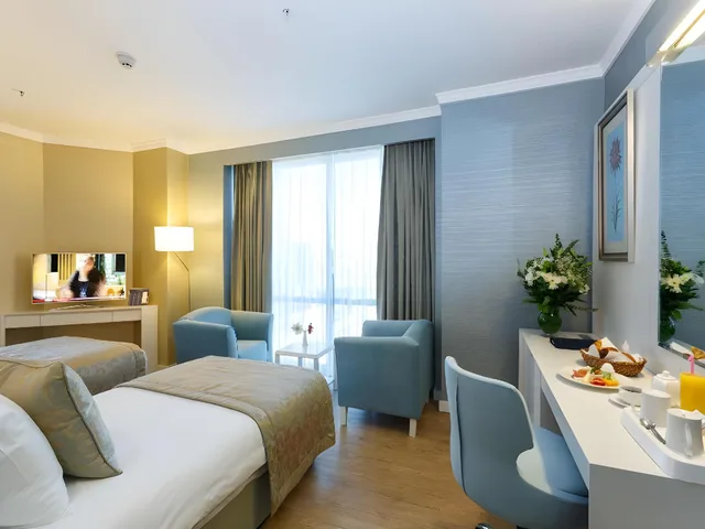 غرفة حصرية بسرير مزدوج وسريرين منفصلين، Byotell Hotel Istanbul 1/1