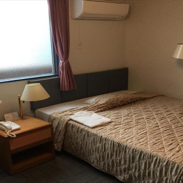 غرفة بسرير كوين، Sunrise Hotel 3/8