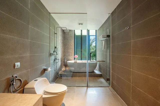 فيلا ديلوكس بسرير كينج وسريرين فرديين بـ3 غرف نوم بمنطقة جلوس بمطبخ، Best Western Premier Sonasea Phu Quoc 6/9