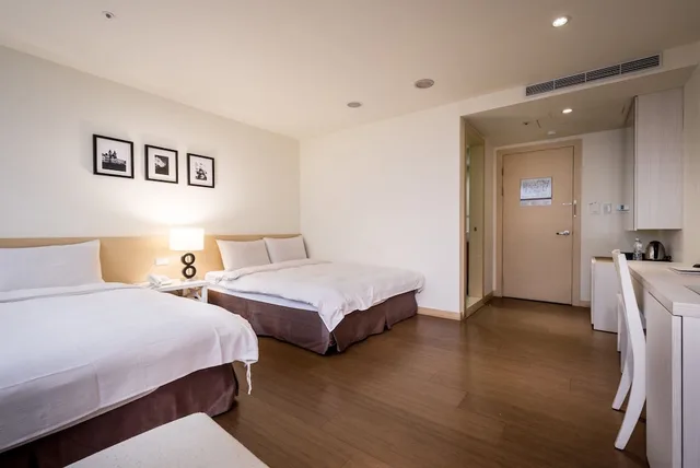 غرفة ديلوكس رباعية بسريرين مزدوجين بإطلالة على المدينة، We Meet Taipei Hotel 7/10