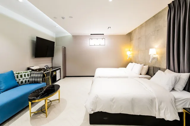 غرفة بزنس بسرير مزدوج وسرير فردي، Air Sky Hotel Busan 2/7