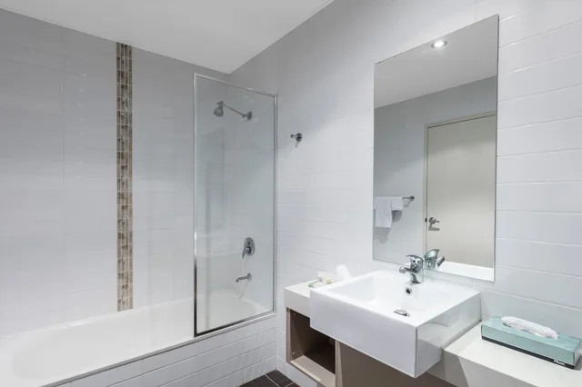 غرفة عائلية بسرير كوين وسرير فردي مع أريكة، Hunter Gateway Motel 5/6