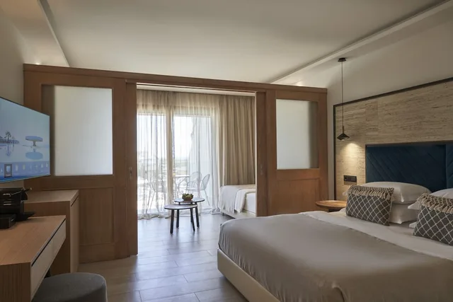 Premium, Family, Queen Bed, Inland View, 2 Sofa، Atlantica Aegean Blue 1/3