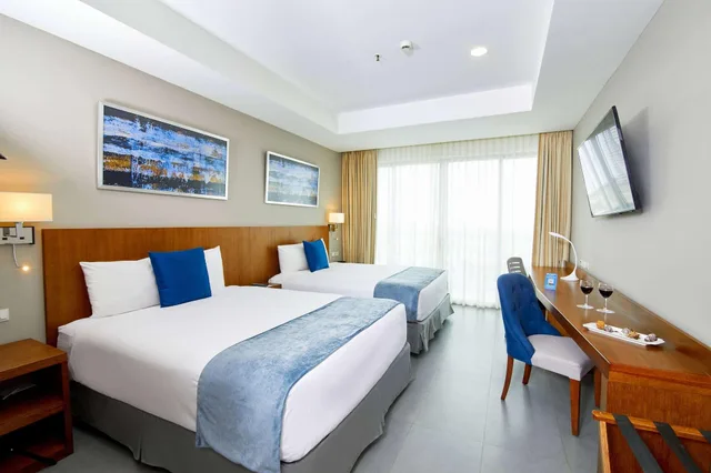 غرفة ديلوكس بسرير مزدوج، Wyndham Manta Sail Plaza Hotel and Convention Center 1/4