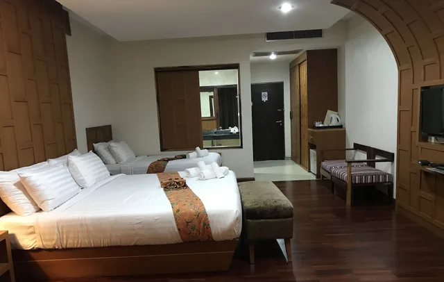 جناح جونيور ثلاثي بسرير كينج وسرير فردي، Taman Spa Resort 2/10