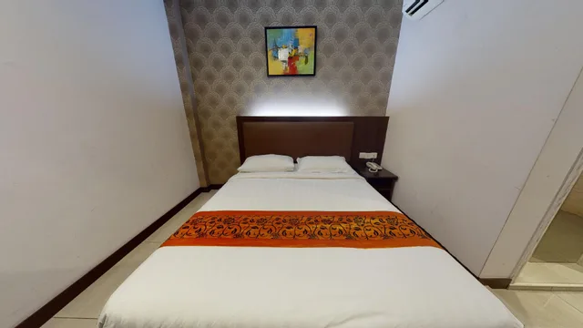 غرفة ديلوكس بسرير كوين، Sunrise Hotel 4/4