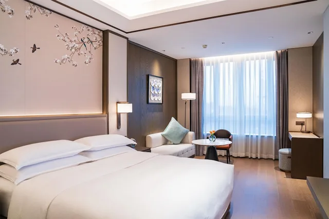 جناح ديلوكس بسرير كينج، Yuexiu Hotel Guangzhou, Curio Collection by Hilton 1/8