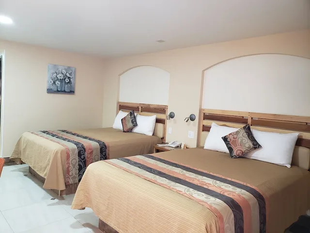 غرفة ديلوكس رباعية بسريرين كوين، La Villa de Zaragoza 3/9