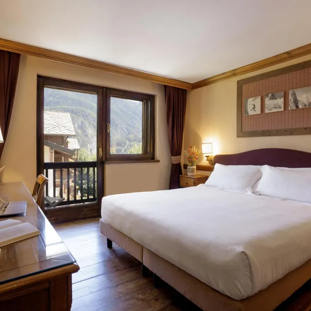 غرفة كلاسيكية بسرير مزدوج أو سريرين منفصلين، Qc Terme Montebianco 1/4