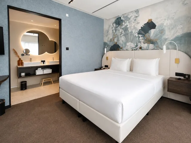 غرفة عائلية بسرير كينج وسرير بطابقين، Van der Valk Hotel Gent 1/2