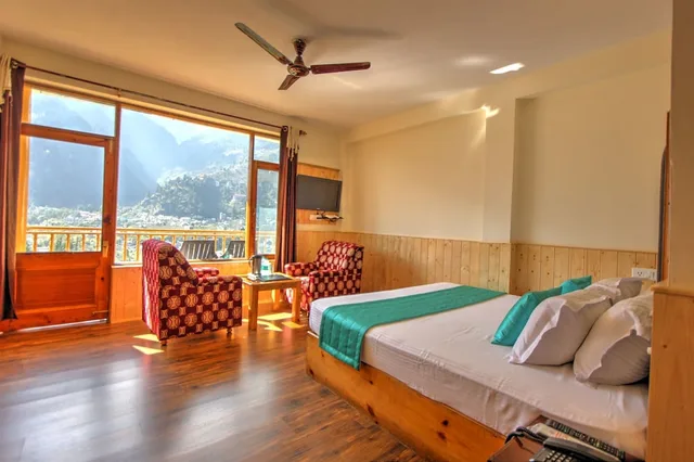 غرفة فاخرة بسرير كوين بإطلالة على الجبل بشرفة بغرفة نوم واحدة، Hotel Mountain Face By Snow City Hotels 2/5