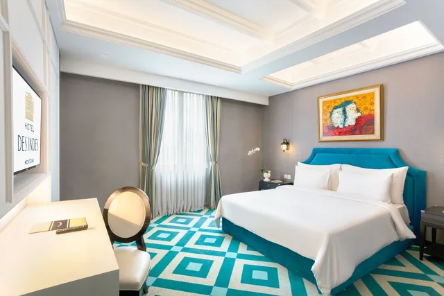 غرفة غراند ديلوكس بسرير كينج وسرير كوين، Hotel Des Indes Menteng 1/3