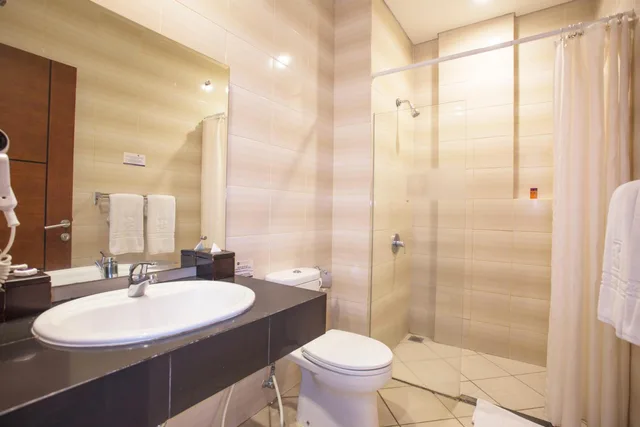 غرفة ديلوكس بسرير مزدوج أو سريرين منفصلين بشرفة، Kuta Central Park Hotel 4/4