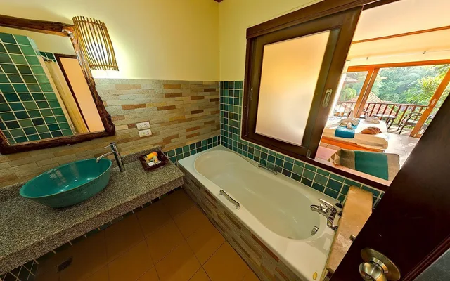 غرفة ديلوكس بسرير مزدوج أو سريرين منفصلين بإطلالة على المسبح بشرفة، Andamanee Boutique Resort Aonang Krabi 9/9