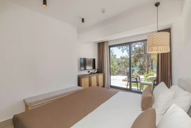 غرفة عائلية رباعية بسرير كوين وسريرين منفصلين بإطلالة على الحديقة، Meri Hotel Oludeniz 1/5