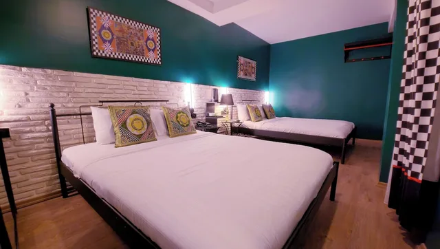 غرفة قياسية رباعية بسريرين كوين، Think Hotel 5/9