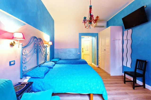 غرفة كلاسيكية ثلاثية بسرير فردي وسرير كوين، Dream Station Bed And Breakfast 4/7