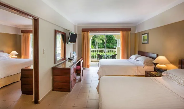 غرفة عائلية بسرير كينج وسريرين مزدوجين، Occidental Caribe 1/1