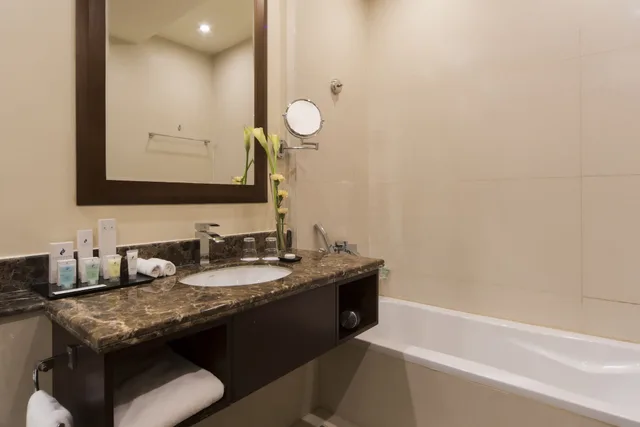 غرفة ديلوكس بسرير كينج، Concorde Hotel Doha 6/7