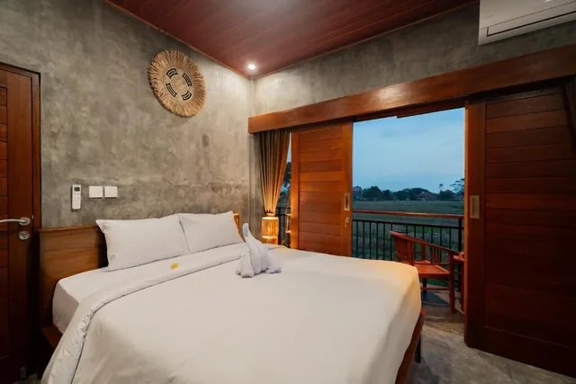 غرفة ديلوكس بسرير كوين بإطلالة على الحديقة، Joni Ubud Hostel 3/6