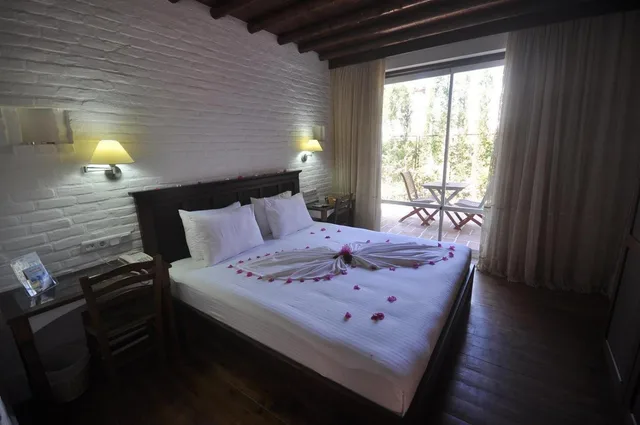غرفة قياسية بسرير مزدوج أو سريرين منفصلين بإطلالة على الحديقة، Aochalong Villa Resort & Spa 3/4