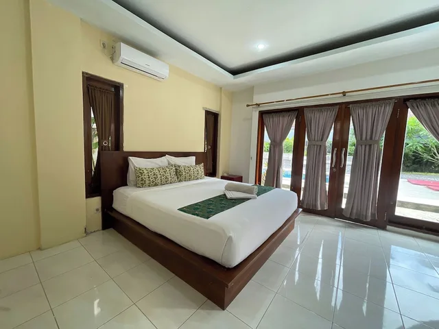 غرفة غراند بسرير كوين، Melati Resort & Hotel 1/5