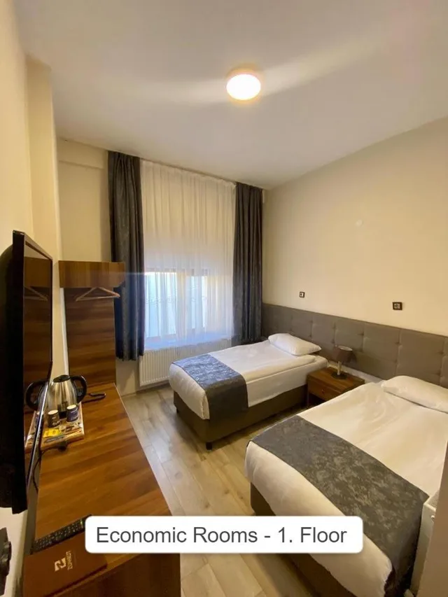 غرفة اقتصادية بسرير مزدوج، Zumrut Palas Otel 2/8