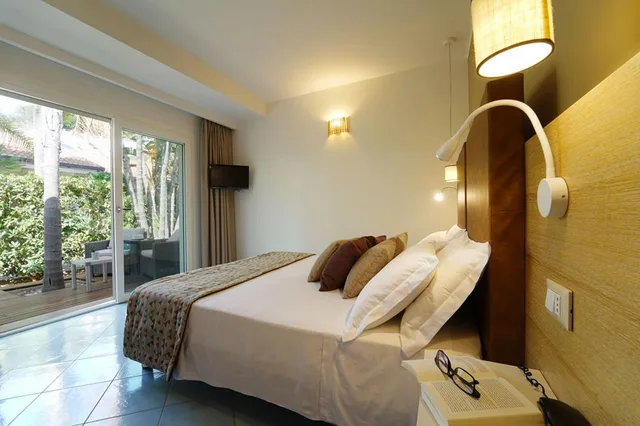 غرفة بريستيج بإطلالة على الحديقة، Baia Del Godano Resort & Spa 1/2