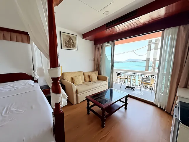 غرفة ديلوكس بسرير كينج بإطلالة على البحر، The Orchid Hotel And Spa Kalim Bay 9/10