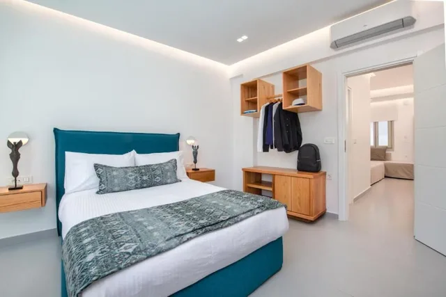 جناح ديلوكس بسرير كوين مع أريكة، Harmony Suites 5/10