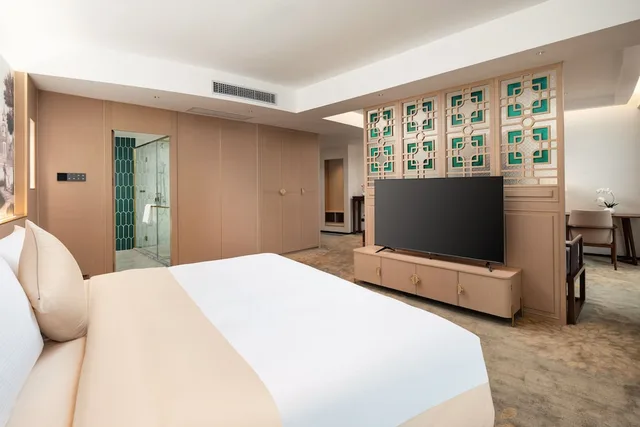 جناح بزنس بسرير كينج وسرير كوين، Guangzhou Wogo Yuanbao Hotel (Zhujiang New Town) 2/3