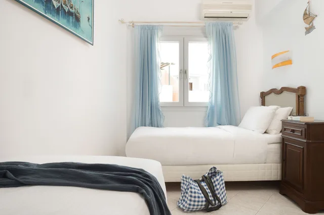 2 Bedrooms, Deluxe, Suite, 1 Double and 3 Single Beds, Sea View، Tinos Resort Hotel 1/3