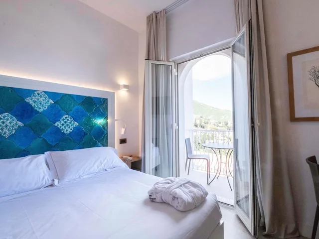 غرفة ديلوكس بسرير كوين بإطلالة على البحر، Splendid Hotel Taormina 3/7