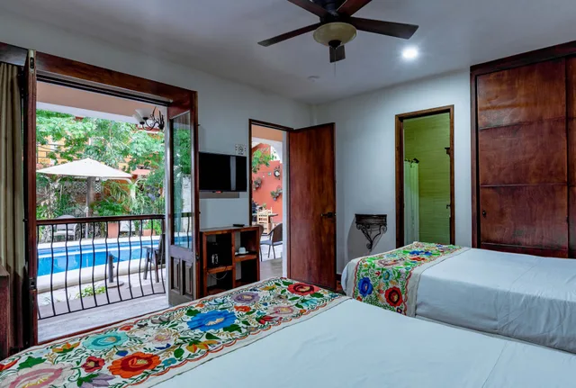 غرفة قياسية رباعية بسريرين مزدوجين، El Zaguán Colonial 1/7