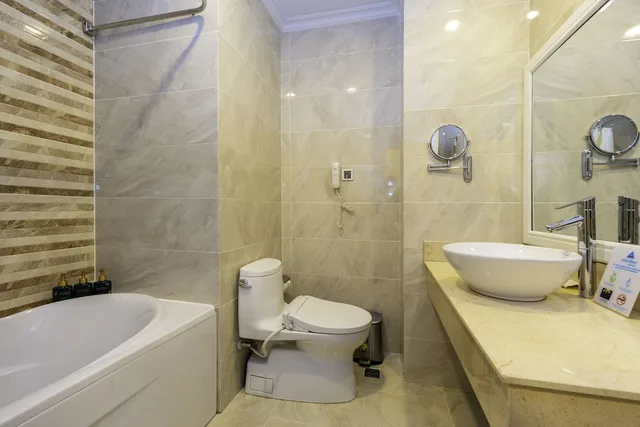 غرفة ديلوكس بسريرين منفصلين وسرير كوين بإطلالة على البحر، Thien Thanh Resort 6/6