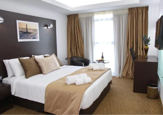 غرفة قياسية بسرير كوين مع أريكة، Breeze Boutique Hotel 1/3
