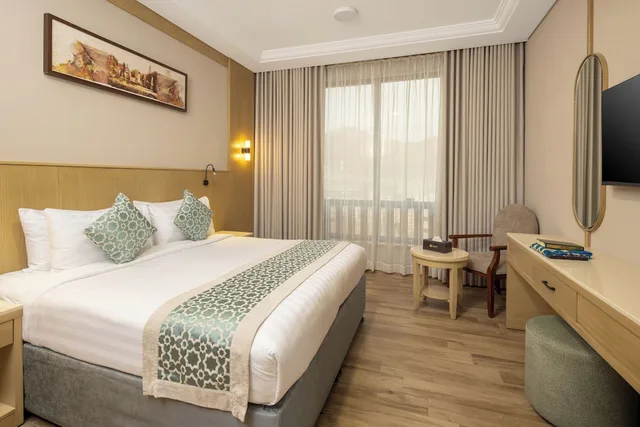 Connecting, 1 Double and 3 Single Beds، فندق عفراء(Afraa Hotel) 5/10
