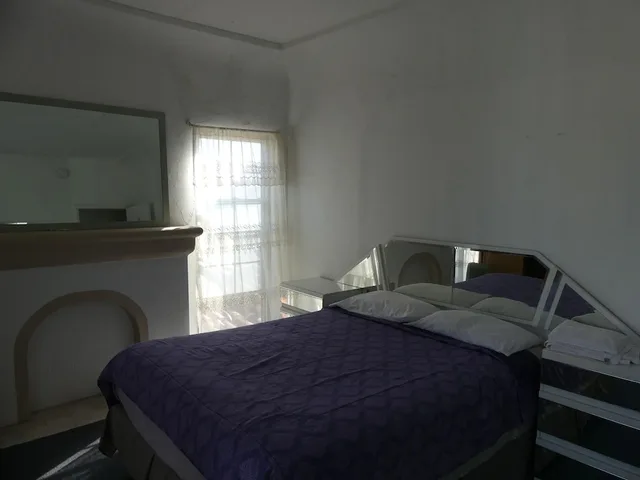 غرفة بسرير مزدوج بحمام مشترك، Wilshire Orange Hotel 2/6