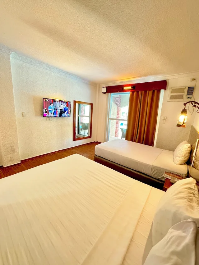 غرفة سوبيريور بسرير كوين وسرير فردي، Roman Empire Panglao Boutique Hotel 2/2