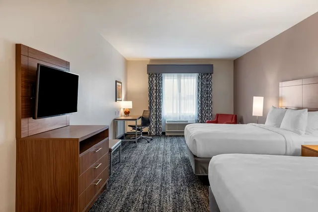 Suite, 2 Queen Beds, Sofa, Bathtub, Accessible, Best Western Plus Coachella Valley Inn & Suites 1/4