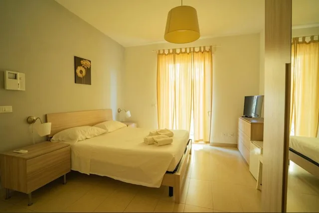 غرفة بسرير مزدوج أو سريرين منفصلين، Isa Fiumicino Airport Residence 4/10
