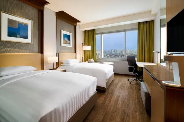 غرفة بسريرين منفصلين مع دخول الصالة في طابق مرتفع، Courtyard By Marriott Seoul Times Square 4/8