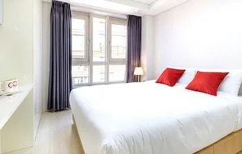 غرفة بسرير مزدوج أو سريرين منفصلين، Shin Shin Hotel Seogwipo 1/1