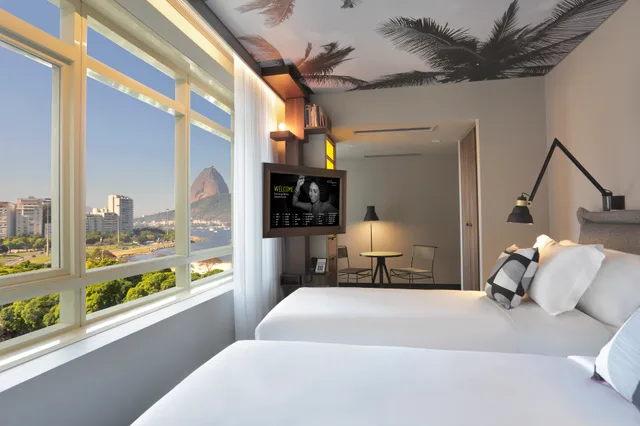 Superior, Triple, 1 Queen and 1 Single Bed, Partial View، Yoo2 Rio de Janeiro, Tapestry Collection by Hilton 1/2