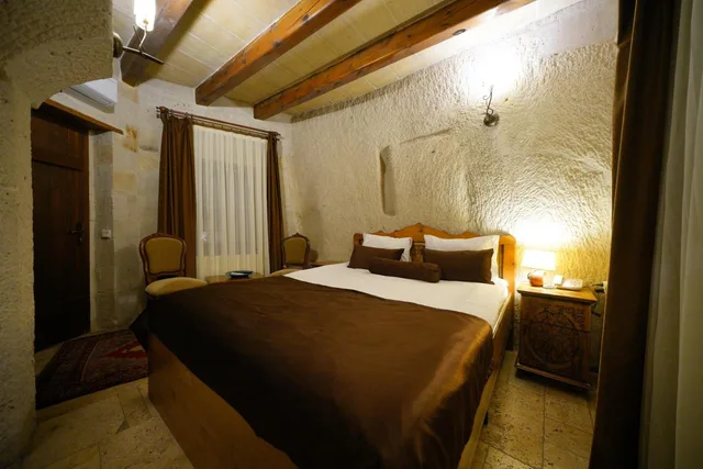غرفة اقتصادية بسرير كوين، Harman Cave Hotel 1/1