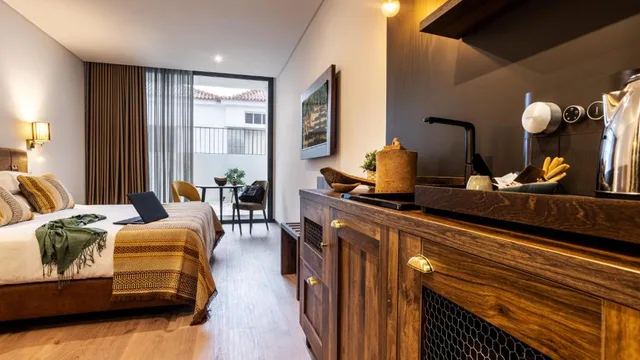 غرفة بسرير مزدوج أو سريرين منفصلين بشرفة، Evora O Cante Hotel 1/2