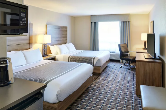 غرفة ديلوكس بسريرين كوين بمطبخ، Pomeroy Inn And Suites Vermilion 1/2
