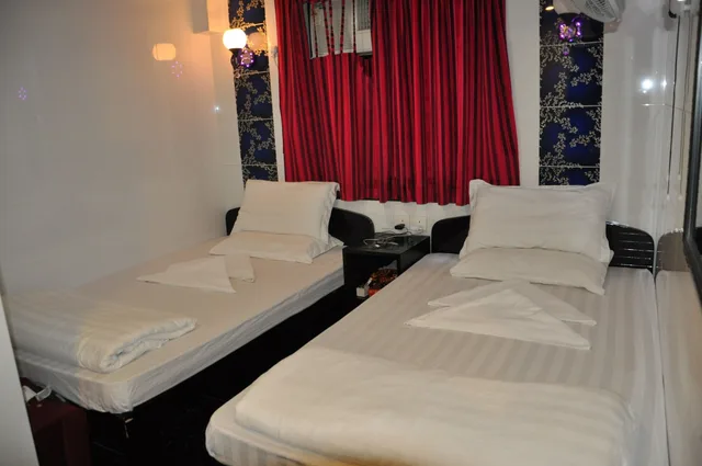 غرفة ثلاثية بسرير مزدوج وسرير فردي، New Guangzhou Guest House 2/4